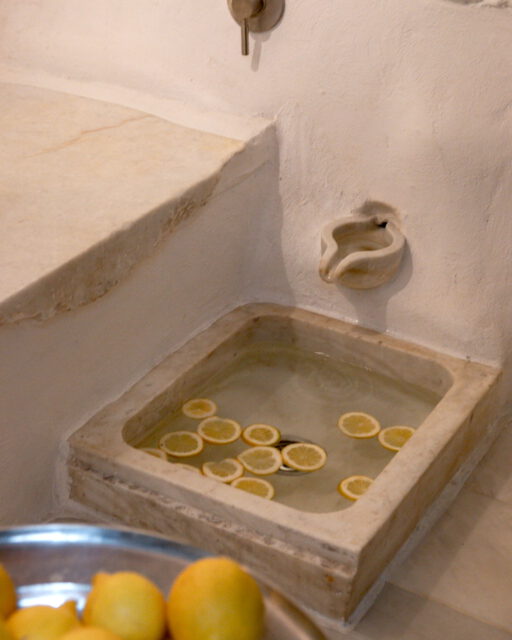 Footbath. 
Cool marble, water, and lemons—simple, like in ancient baths. 
Part of our spa, a quiet moment to pause.
🍋🍋🍋

#tinos #ancientbaths #marble #rituals
